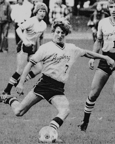 Photo of Mike Kennedy playing soccer when he attended Augsburg University